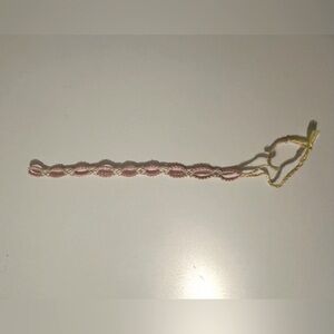 Pink and white daisy chain friendship bracelet